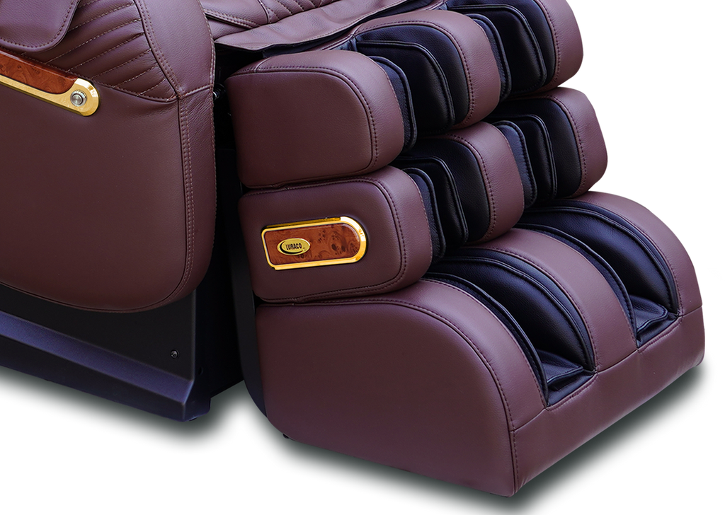 Royal Edition gold-accented armrest and footrest trim detail