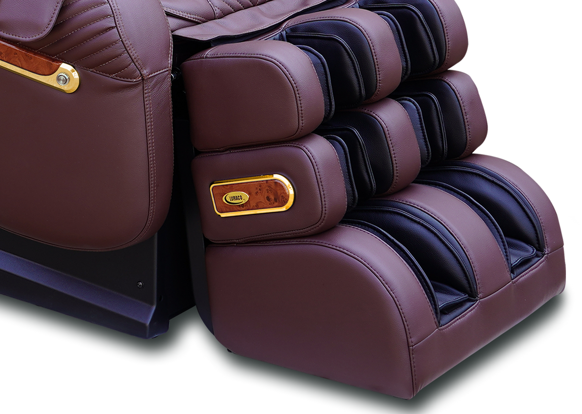 Royal Edition gold-accented armrest and footrest trim detail